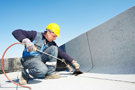Hot-air welded seam being run on a TPO roof membrane